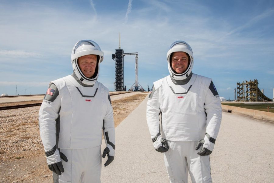 Astronauts Douglas Hurley and Robert Behnken pose at a dress rehearsal for the Demo-2 mission.
